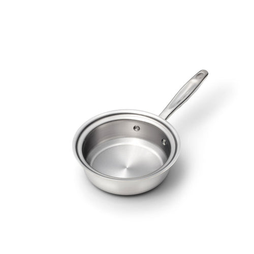 Top-down view of 1 Quart stainless steel saucepan showcasing polished interior and riveted handle on white background