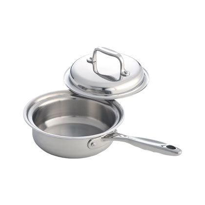 Three-quarter view of 1-quart stainless steel saucepan with cover showcasing polished interior and long riveted handle on white background