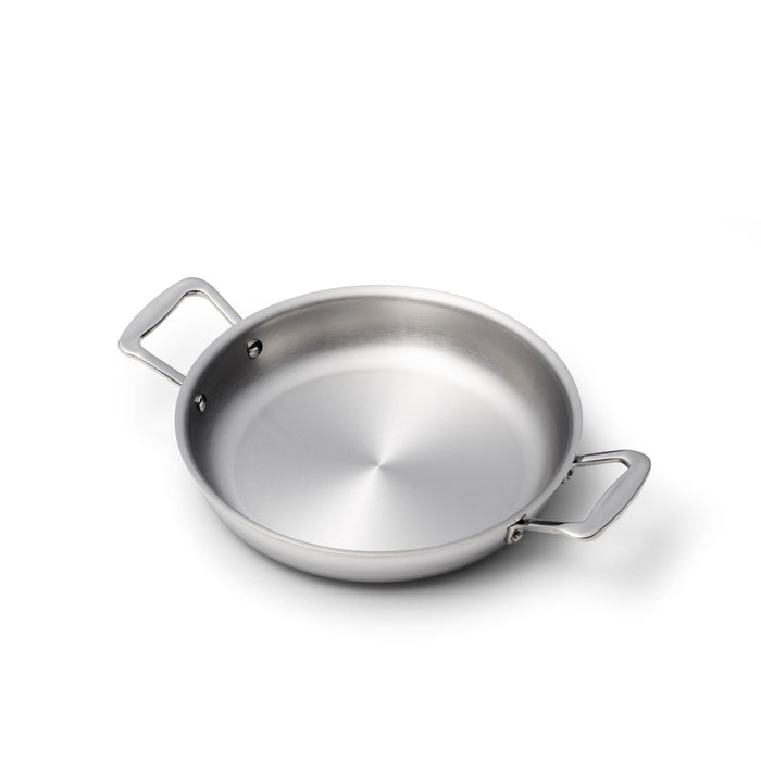 Angled view of 10 Inch Fry Pan with Short Handles showcasing stainless steel construction and two short handles with a white background