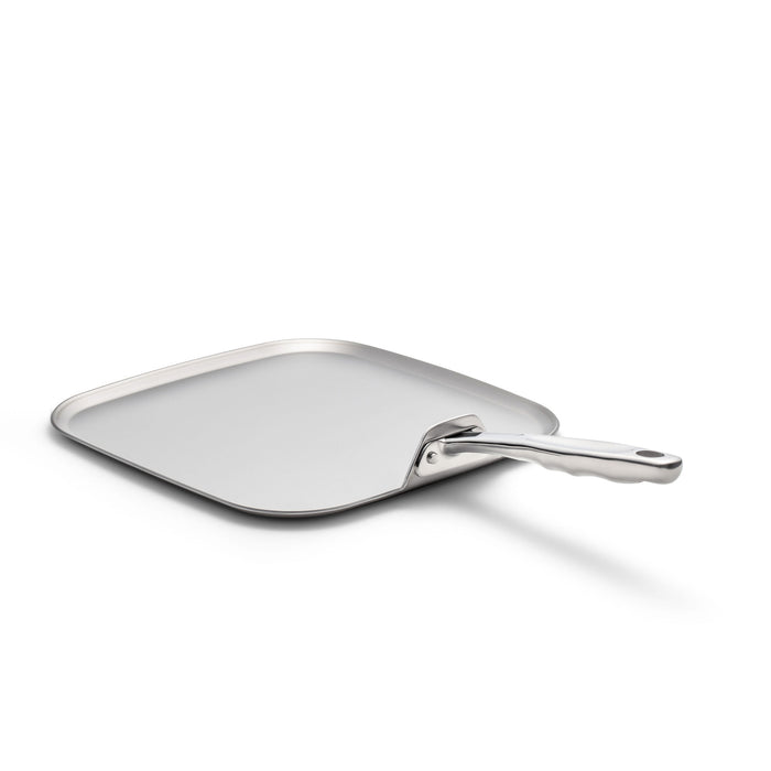 Angled view of 11 Inch Square Griddle showing flat cooking surface, low rim, and riveted long handle on white background
