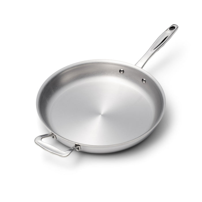 Angled view of 11.5 inch stainless steel fry pan showcasing its long handle and helper handle on a white background