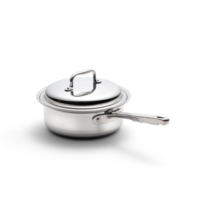 Three-quarter view of 2 Quart stainless steel Saucepan with Cover showcasing ergonomic long handle with white background