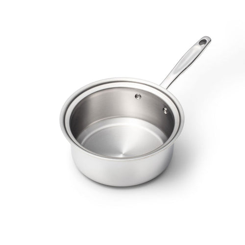 Angled top view of 3-quart stainless steel saucepan showing brushed interior and long riveted handle on white background