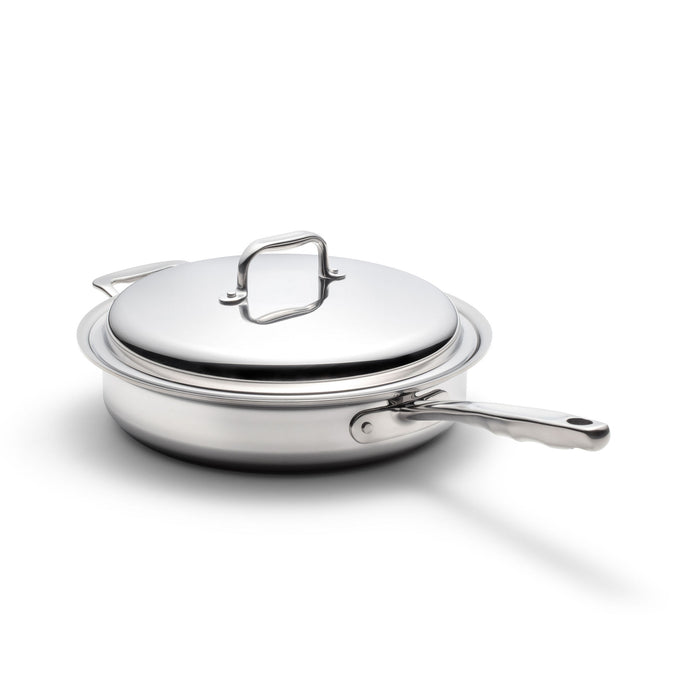 Angled view of 3.5 Quart Sauté Pan with Cover showcasing stainless steel construction and long handle on a white background