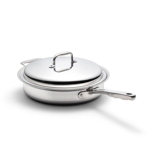 Angled view of 3.5 Quart Sauté Pan with Cover showcasing stainless steel construction and long handle on a white background