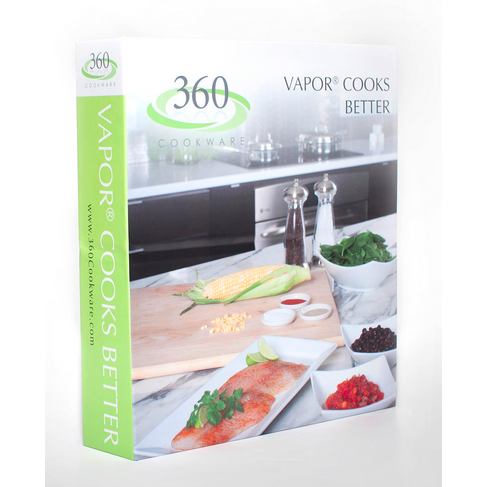 Three quarter view of 360 Cookbook binder showing cover photo of salmon, corn and spice bowls on a marble kitchen counter