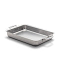 Angled view of 9 inch by 13 inch Bake and Roast Pan with Handles showcasing stainless steel on a white background