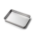 Angled view of 9 inch by 13 inch Bake and Roast Pan showcasing stainless steel construction with no handles on a white background
