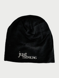 The Slouchy "Just Thinking" Beanie by Simply Eartha is a cozy black winter hat with "just THINKING" embroidered in white on the front, ideal for a thoughtful cap.