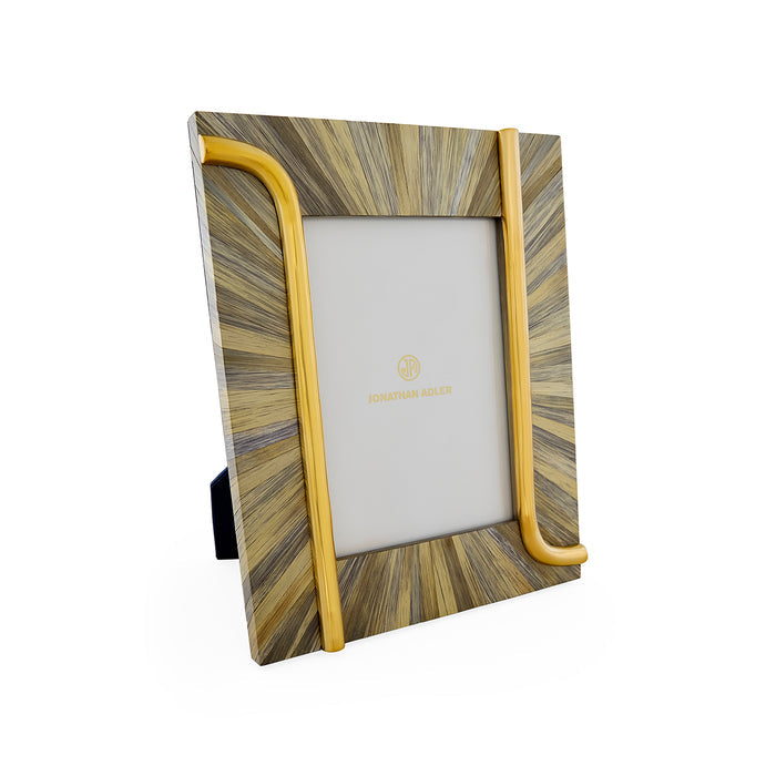 Wooden photo frame with gold accents on a white background