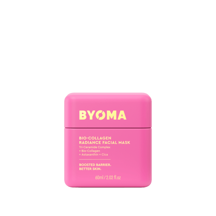 Pink facial mask container with 'BYOMA' branding on a green background