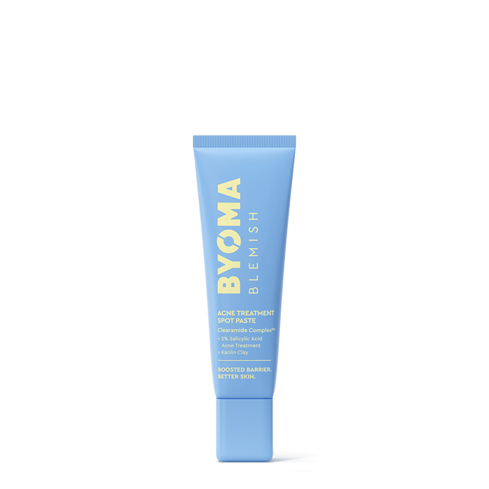 A light blue squeeze tube of BYOMA BLEMISH Acne Treatment Spot Paste, featuring yellow lettering, centered on a clean white background.