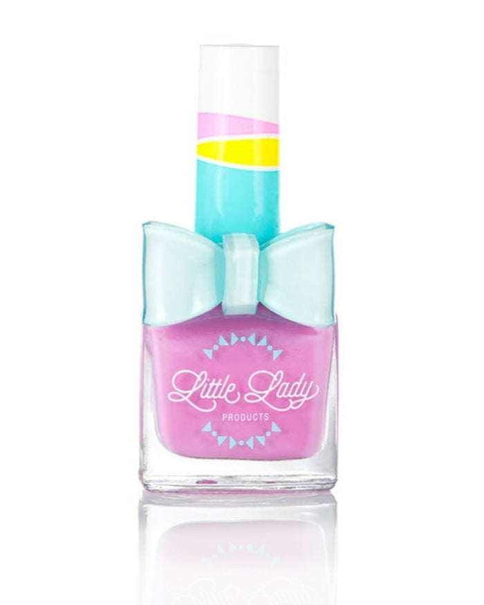 Butterfly Flutter nail polish bottle with a blue bow, offering purple hues and fruity scents, perfect for kids' mini-manicures from Little Lady Products.