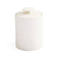 A white ceramic canister with a matching lid, featuring a textured honeycomb pattern on the lower half and vertical ribbing on the upper half, set against a plain white background.