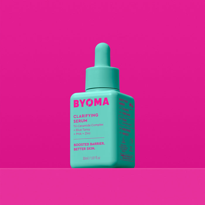A BYOMA Clarifying Serum in a teal bottle with a dropper cap.