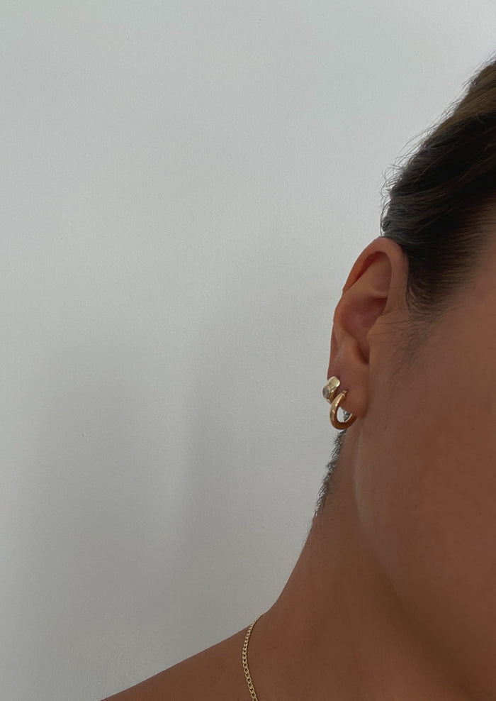 alt="Classic Hoop Earrings - Extra Small styled with the Ynez dome huggies"