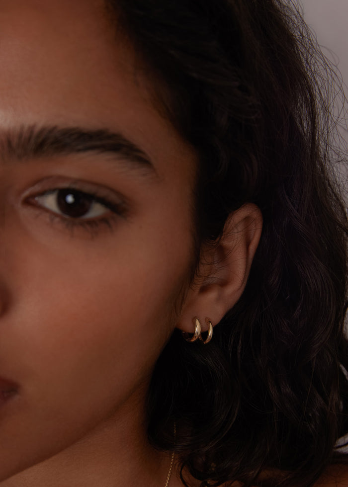 alt="Mini Hoop Huggie Earrings"