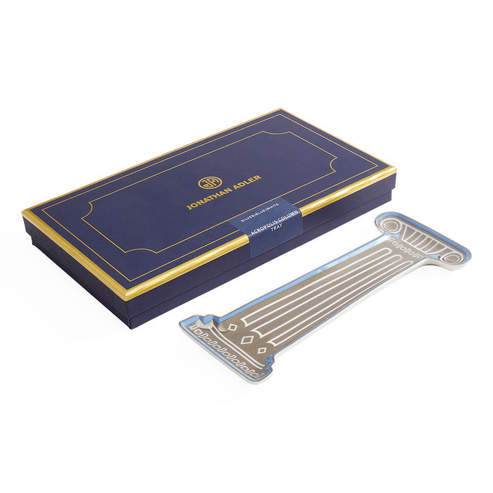 Jonathan Adler American Gothic Hand Lettered Iron Paper and Acrylic Combo Set, featuring a navy blue and gold presentation box alongside a matching metallic silver and gold lettered acrylic piece on a white background.