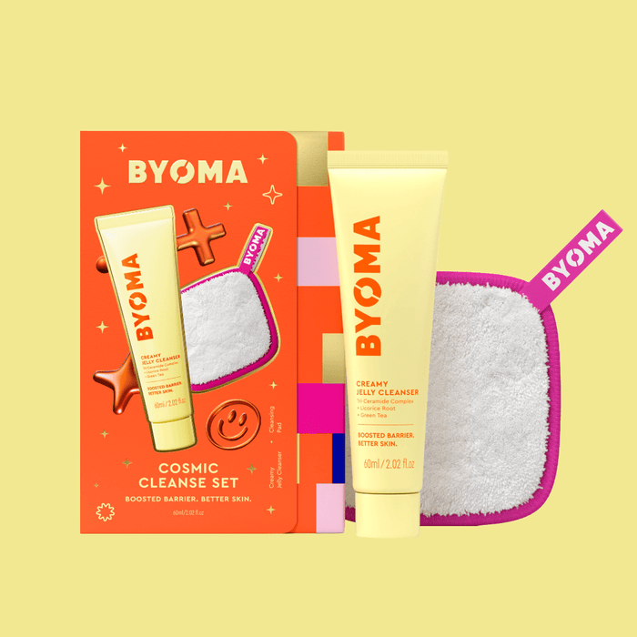 BYOMA Cosmic Cleanse Set with cleanser and pad on a yellow background