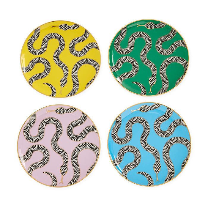 Four decorative plates with snake patterns on a white background