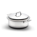 Angled front view of Factory Seconds 6-quart stainless steel stockpot with cover showcasing loop handles on white background