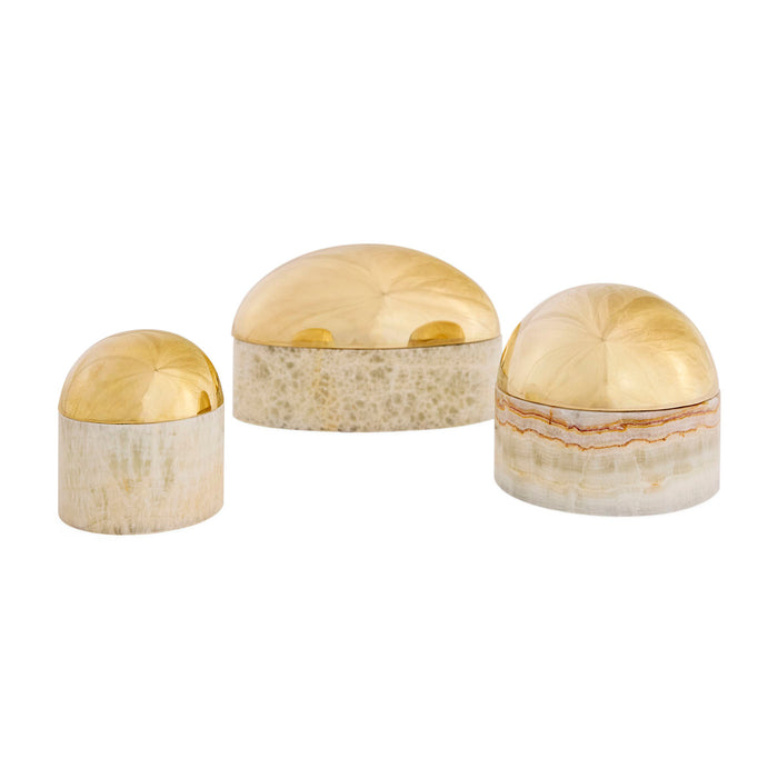 Three decorative boxes with gold and beige patterns on a white background