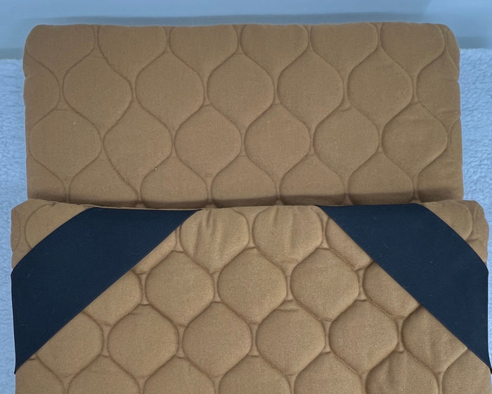 Fms Dog Beds grooming table topper featuring a comfortable, padded dog bed with a non-slip base for grooming comfort.