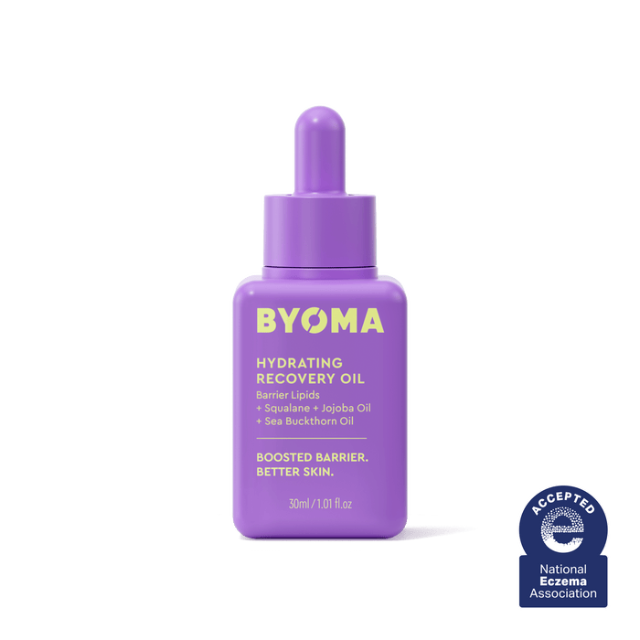 A BYOMA Hydrating Recovery Oil bottle in purple with National Eczema Association seal.