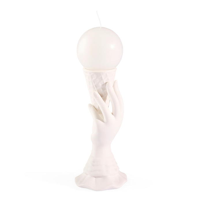 White decorative object with spherical top and branch-like base on a white background