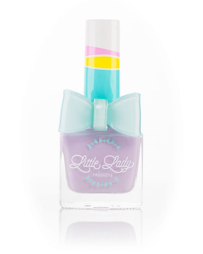 Lady Lilac pastel purple nail polish bottle, featuring a delightful lilac blossom scent and an adorable bow ring accessory, perfect for kids' magical mini-manicures.