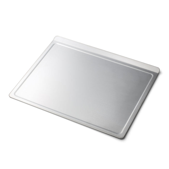 Angled view of Large Cookie Sheet showcasing its generously sized stainless steel surface and raised edges on a white background
