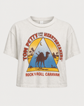 The Madeworn Tom Petty Crop Tee by Madeworn is a white cropped T-shirt featuring a striking graphic of a camel, pyramid, and crescent moon, with “Tom Petty and the Heartbreakers” and “Rock ’N Roll Caravan” printed in bold red and yellow lettering—a must-have vintage band tee for fans or anyone looking to add a standout cropped graphic tee to their collection.