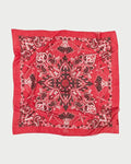 Red bandana with black paisley pattern on a white background
