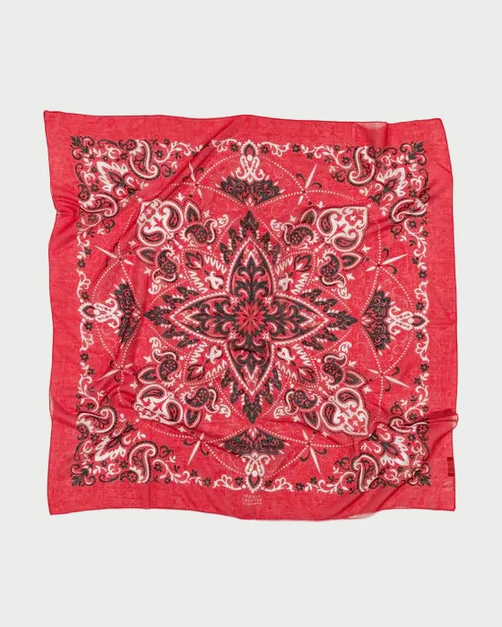 Red bandana with black paisley pattern on a white background