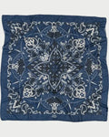 Blue bandana with white patterns on a white background