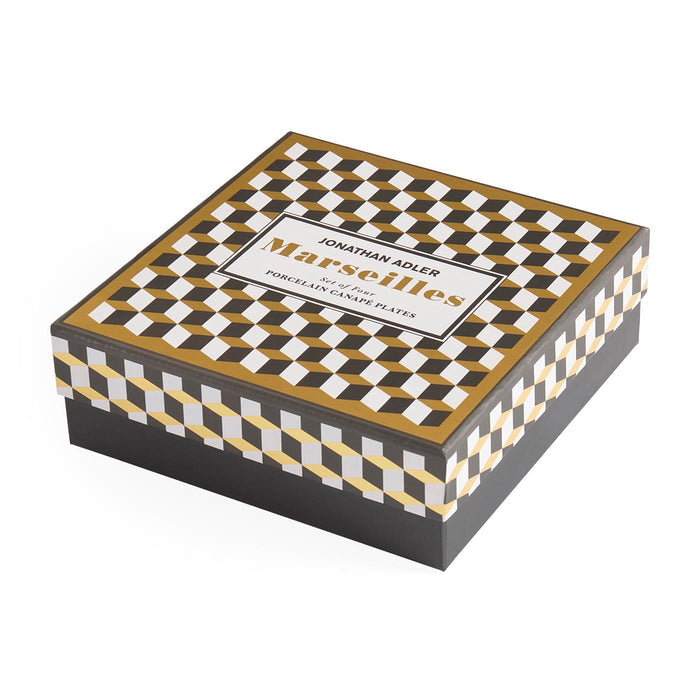 Decorative box with checkered pattern and 'Jonathan Adler Marseilles' branding on a white background