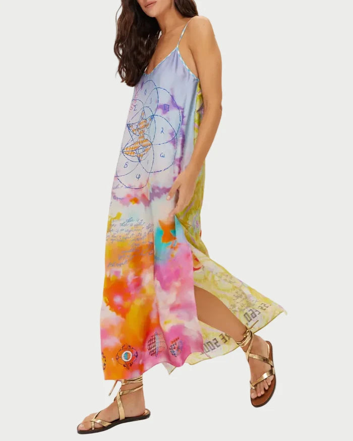 Woman wearing a colorful tie-dye dress on a white background