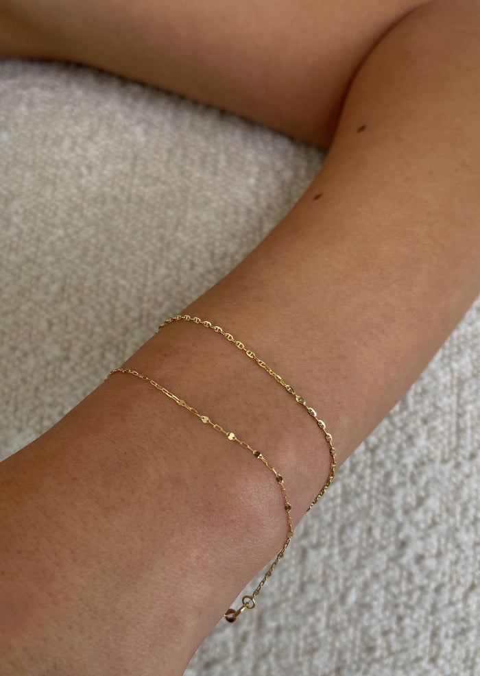 alt="Mariner Chain Bracelet and diamond cut rolo bracelet"