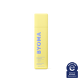 A yellow bottle of Byoma Milky Moisture Cleanser with the National Eczema Association seal.