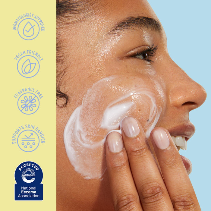 Woman applying cream to her face with a blue background and product features on the side.