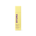 A yellow bottle of Byoma Milky Oil Cleanser, front view on a white background.