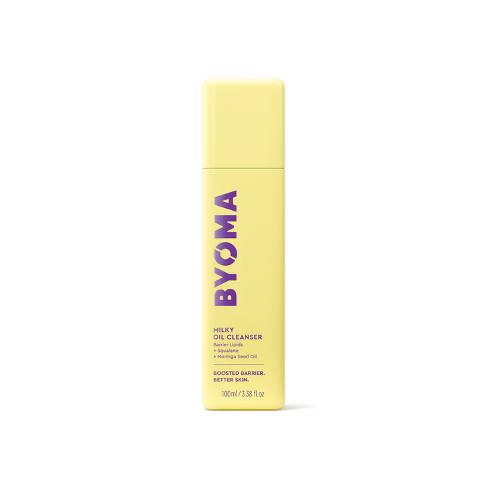 A yellow bottle of Byoma Milky Oil Cleanser, front view on a white background.