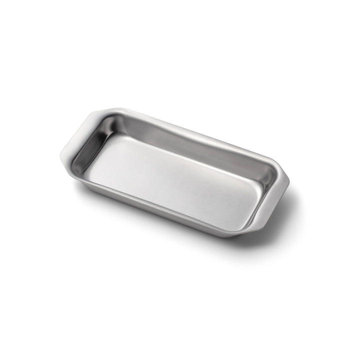 Angled view of Mini Jelly Roll Pan showcasing its sleek, shallow stainless steel design on a white background