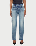 Light blue jeans worn by a person on a white background