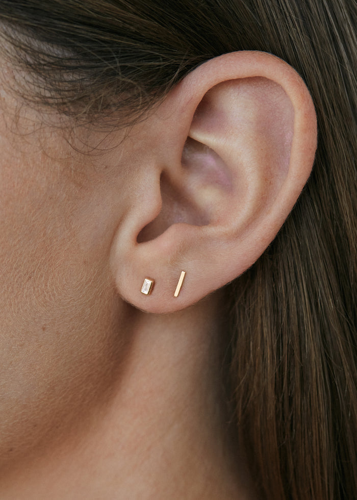 alt="Penelope II Baguette Diamond Studs with petite bar stud"