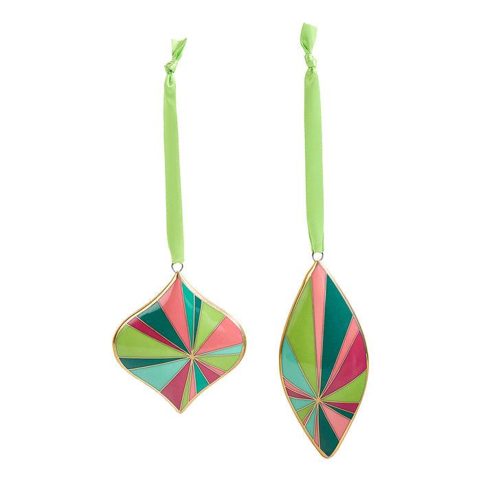 Two hanging ornament shapes with long lime green ribbons, featuring a multicolor geometric fan pattern in green, pink, teal, and light blue outlined with gold trim, on a white background.