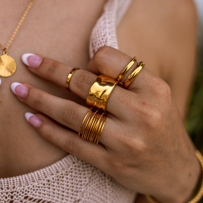 chunky gold ring stack featuring four gold rings