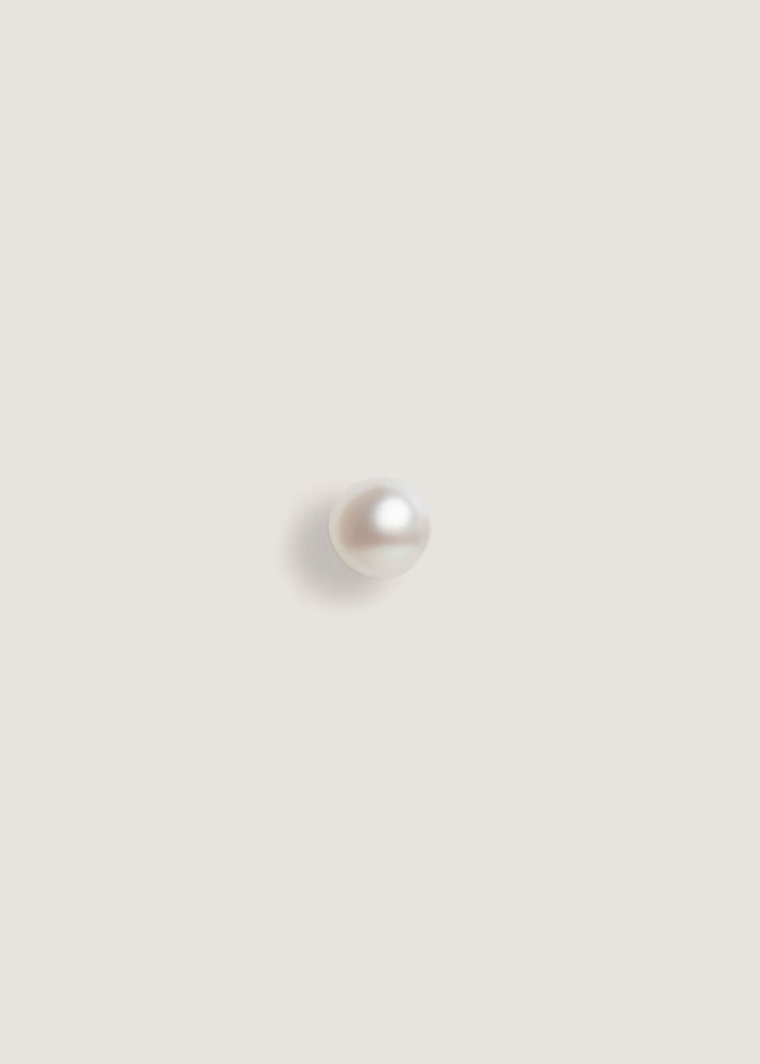A single Kinn 14k Gold Pearl Stud Earring