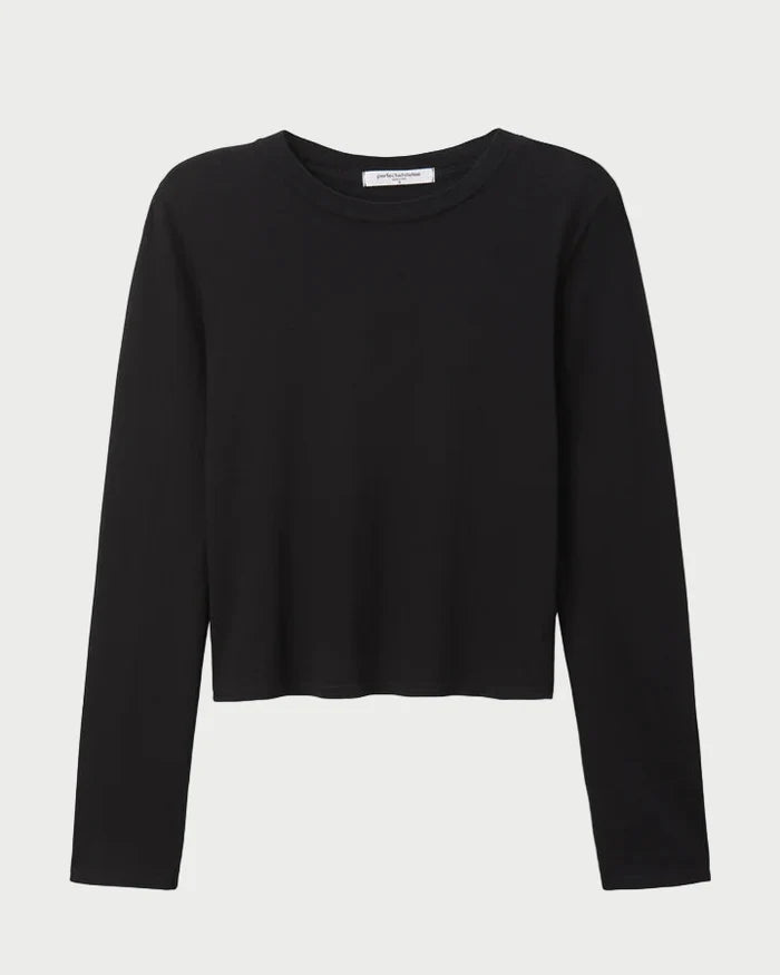 The Perfectwhitetee Jamie Recycled LS Tee Black is a boxy fit, long sleeve crewneck shirt with a slightly cropped hem, made from recycled cotton by perfectwhitetee and shown on a white background.