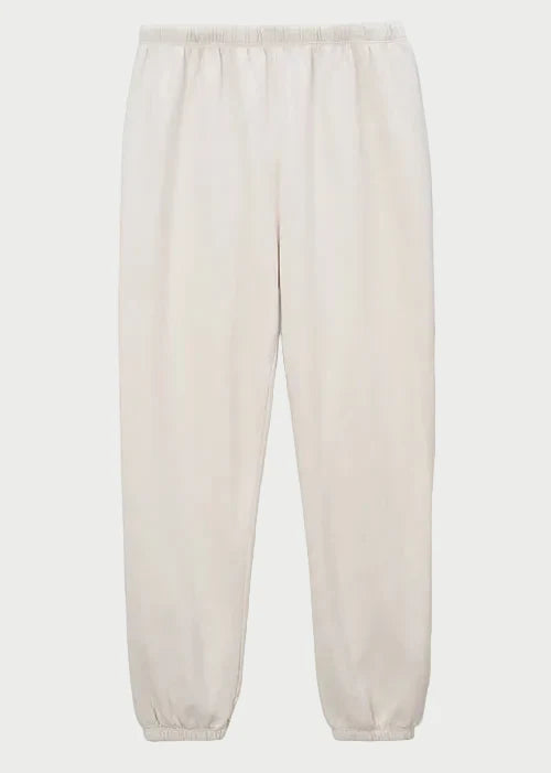The Perfectwhitetee Johnny Sweatpant in Sugar by perfectwhitetee is crafted from soft French terry cotton with an elastic waistband and ankle cuffs, shown on a plain white background.